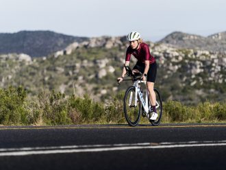 Triathlete riding on road