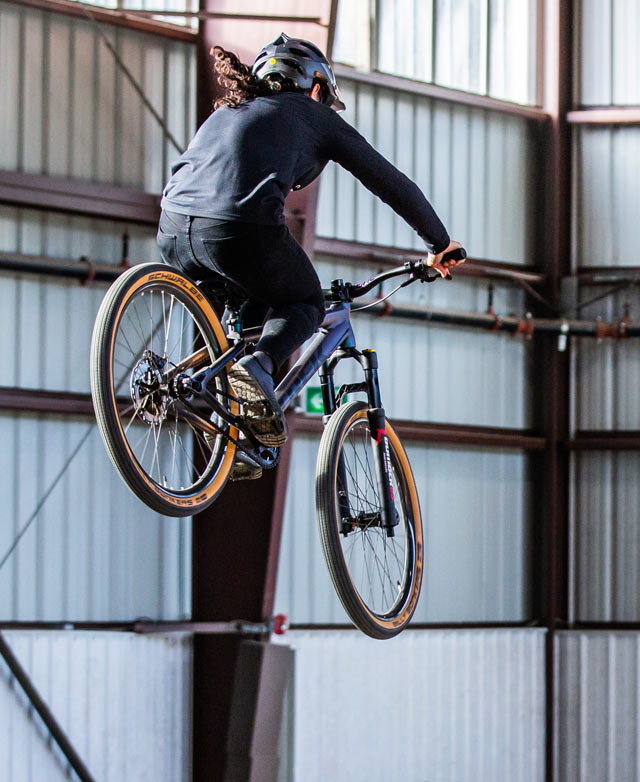 Christina Chappetta jumps on dirt jump