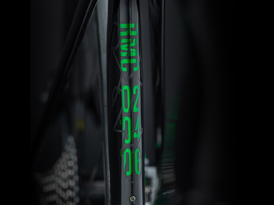 Detail image of Robbie's P1 Ultimate Madone showing 02, 04, and 06 year marks.