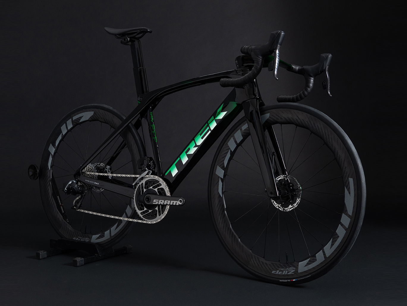 Robbie's Project 1 Ultimate Madone with a black background.