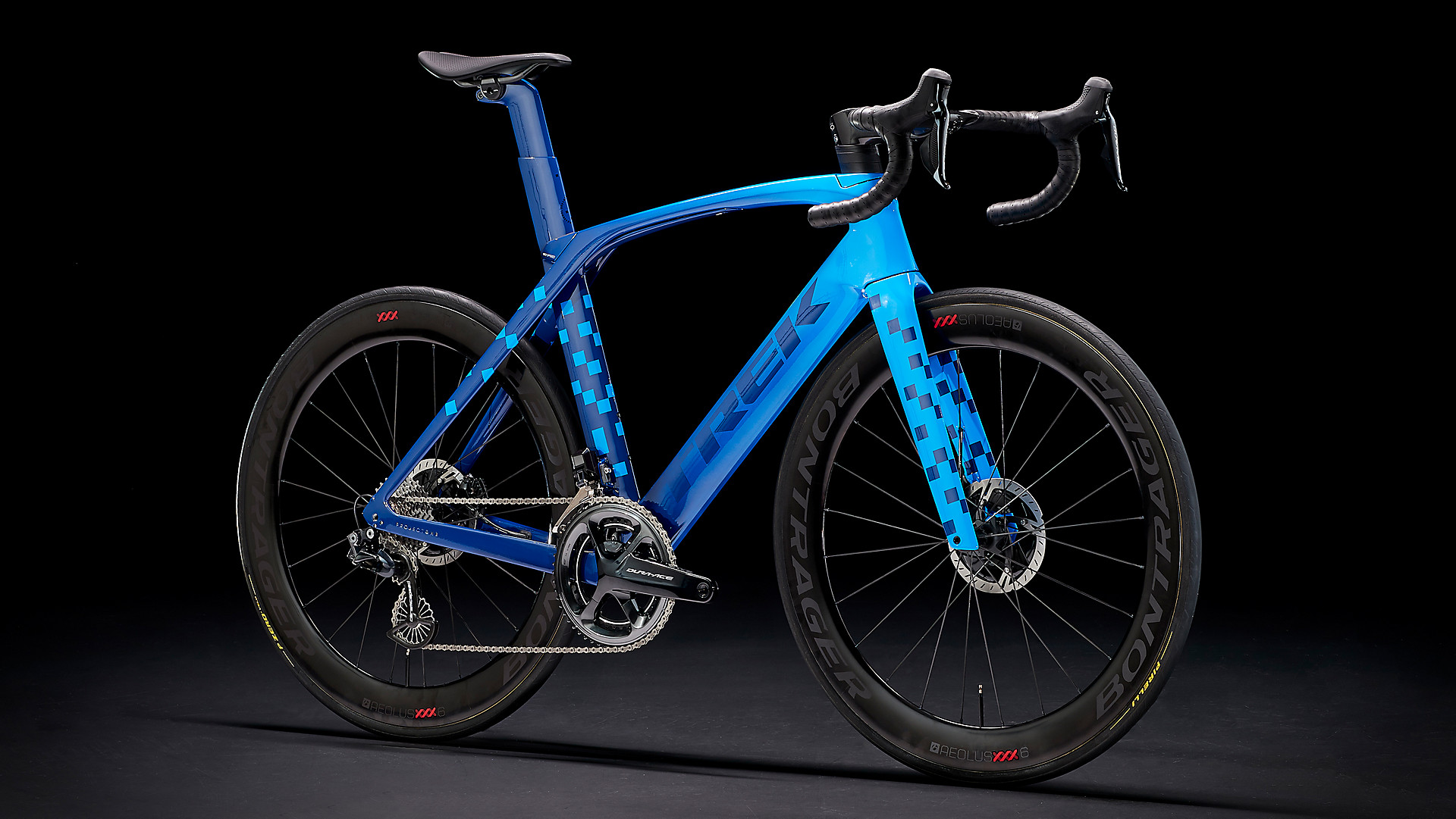A Project One Ultimate Trek Madone with custom blue fade and checkered design.