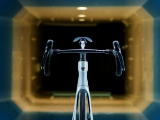 Head-on shot of Madone handlebars with wind tunnel in background